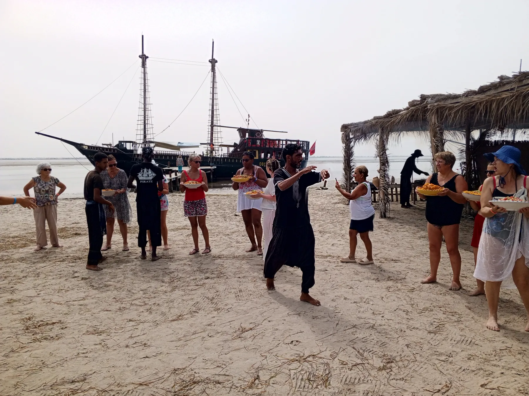 dance and festive atmosphere on the beach pirate boat excursion Djerba